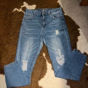 Rue 21 skinny jeans/jeggings with rips
Size 10